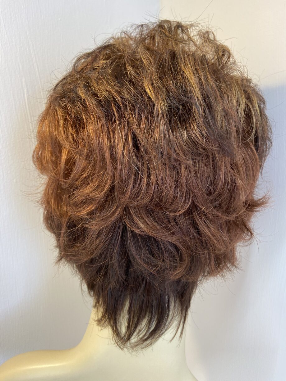 Short brown designer wig. Brss5052